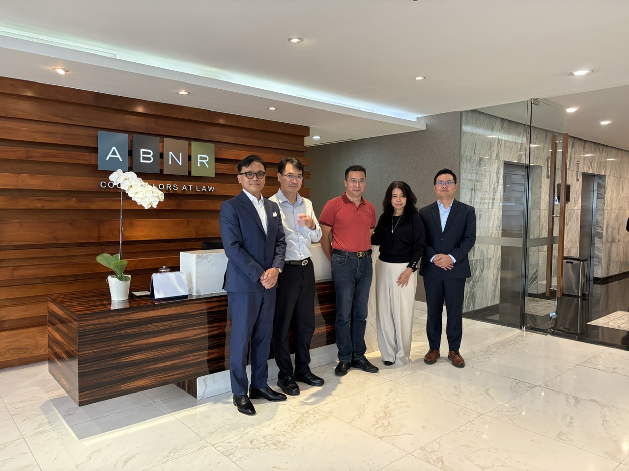 Franc Liu and colleagues during a professional exchange visit at ABNR Counselors at Law